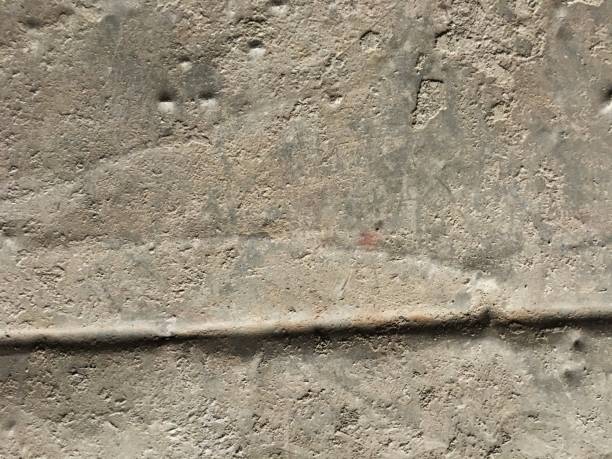 istock metal surface scratched and stained with concrete residues 1190652137