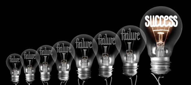 istock Light Bulbs with Failure and Success Concept 1190652320