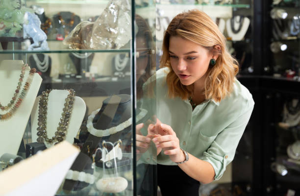 istock Woman choosing natural stone beads 1190655889