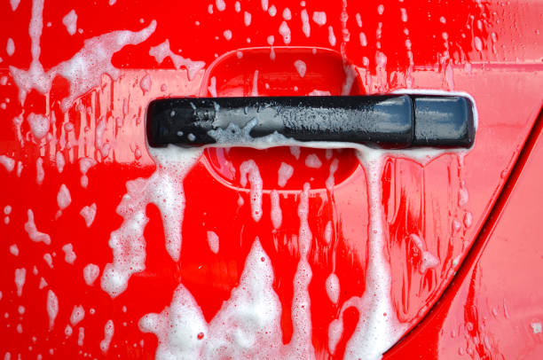istock washing red car outdoor 1190657605