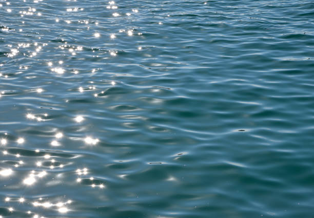 istock Blue sea water surface with ripples and waves 1190662396