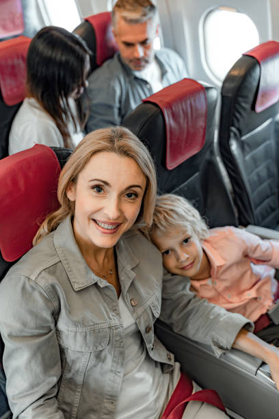 istock Happy woman is looking at camera in cabin 1190663565