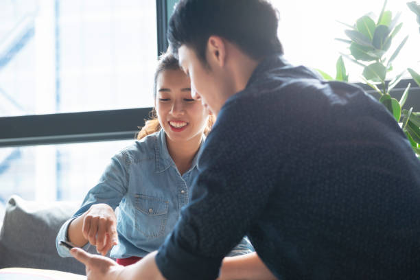 istock Asian couple freelancers work 1190663678