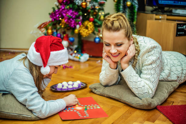 istock Playing board game at Chrismas day 1190669118