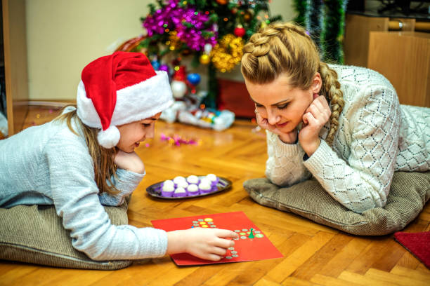 istock Playing board game at Chrismas day 1190669214