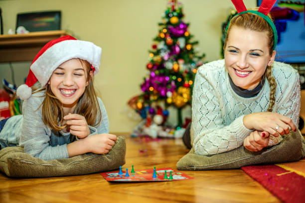 istock Playing board game at Chrismas day 1190669216