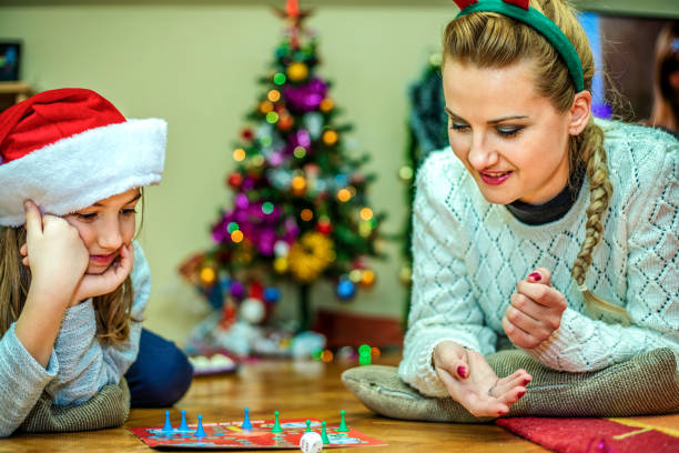 istock Playing board game at Chrismas day 1190669361