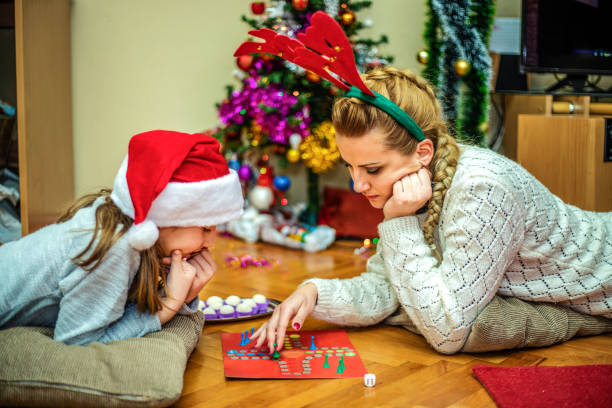 istock Playing board game at Chrismas day 1190669456