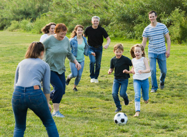 istock Friendly and glad family scoring goals 1190669832