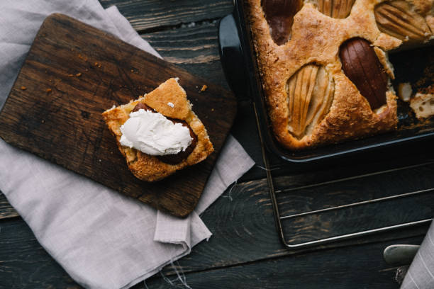 Fall french pear cake in a black ceramic bakeware