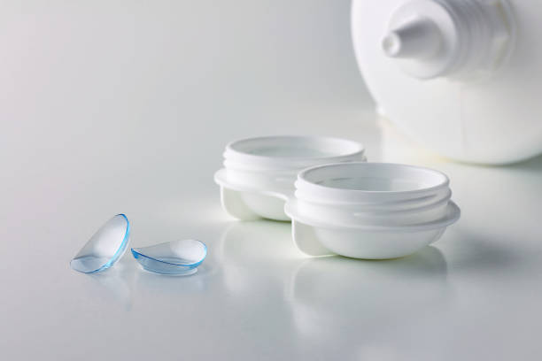 istock Contact lenses, case and bottle with solution on white background 1190674862