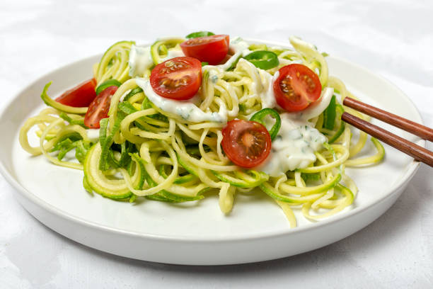 istock Zucchini noodles with vegetables 1190675974