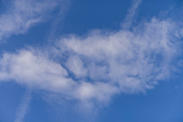 istock Cloudscape. Blue sky and white cloud. Sunny day. Spindrift clouds. 1190677565