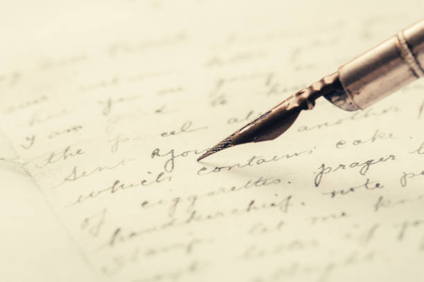 istock fountain pen on paper with ink text closeup 1190677869