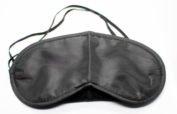 istock Sleeping mask against a white background.Travel conceot. 1190678037