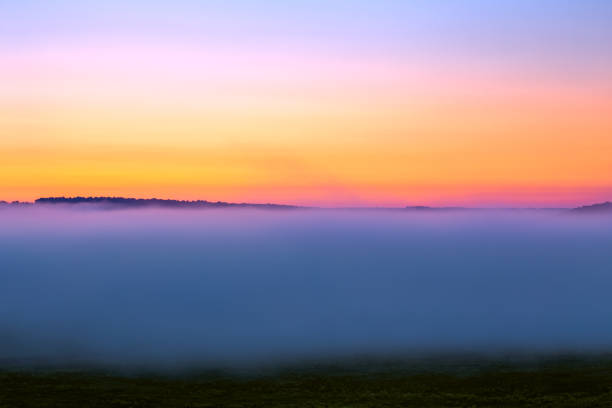 minmalistic foggy sky glow before sunrise without sun