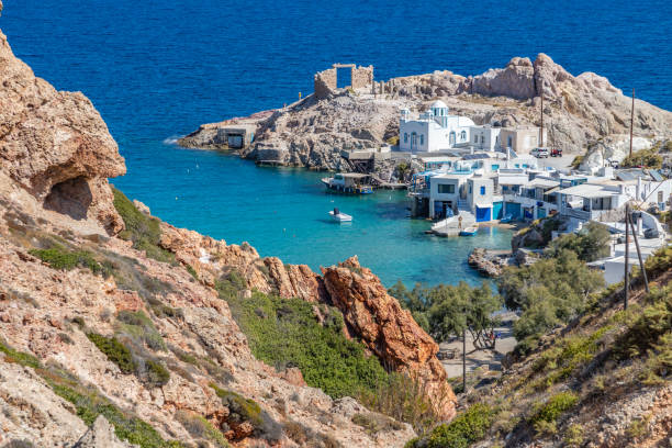 istock Firopotamos beach with church, houses and cliffs 1190684965