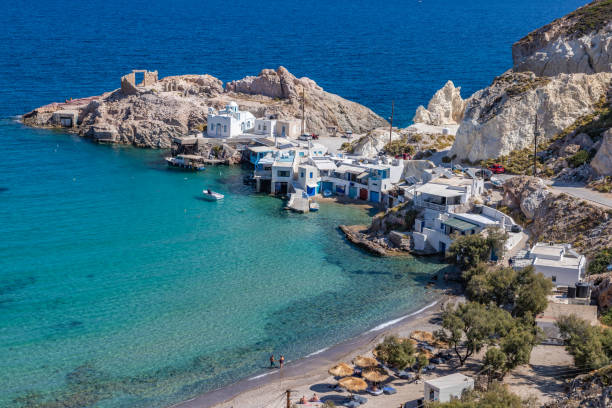 istock Firopotamos beach with church, houses and cliffs 1190685026