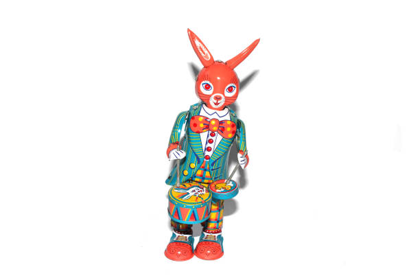 Tin Toy Vintage Drumming Rabbit On White Background