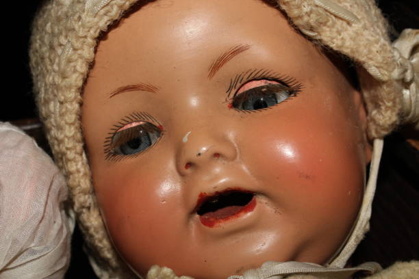 istock Weird Freaky Toy Doll Parts on White Background 1190686481