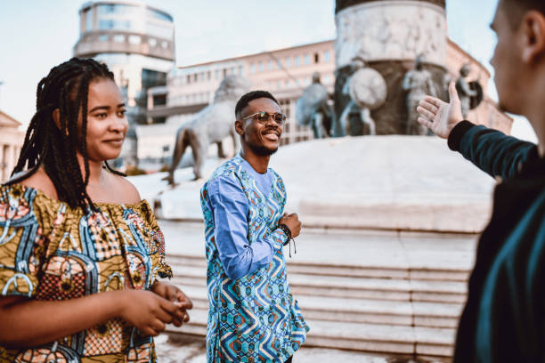 istock Male Explaining Landmark History To African Couple 1190687407