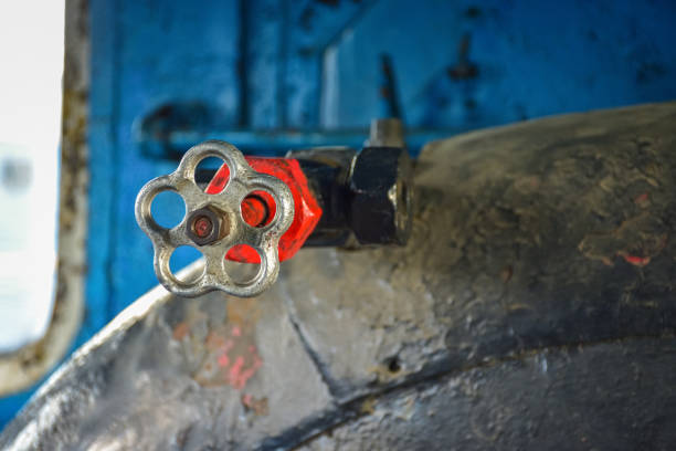 istock Rusty valve in steam train, valve close-up 1190687438