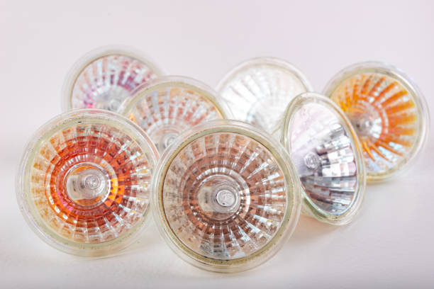 Old halogen bulb. Household electrical accessories. Bright background.