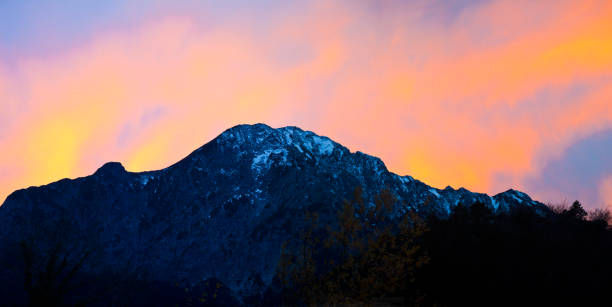 Panoramic view of a mountain in afterglow