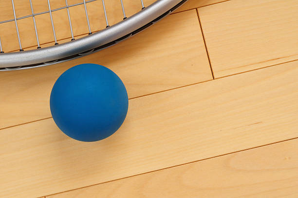 istock Blue Rubber Racquetball and Racquet 119069353