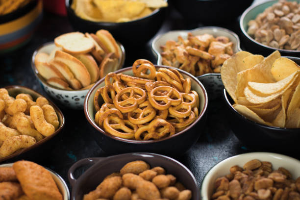 istock Salty snacks served in bowls 1190693774