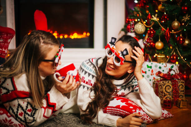 istock Merry Christmas Female Friends 1190694020