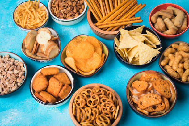 istock Salty snacks served in bowls 1190694026