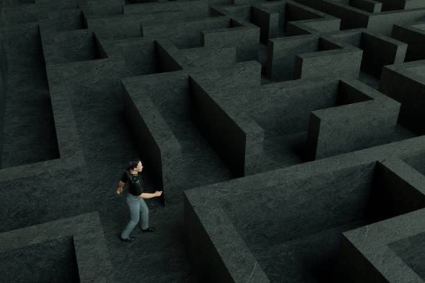 istock 3D maze labyrinth and businessman 1190694261