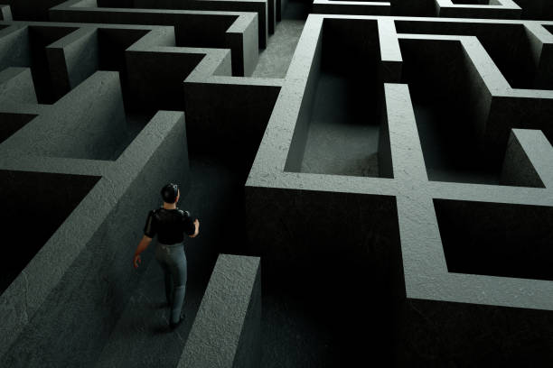 istock 3D maze labyrinth and businessman 1190694339