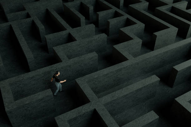 istock 3D maze labyrinth and businessman 1190694886