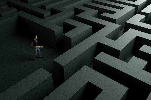 istock 3D maze labyrinth and businessman 1190694933