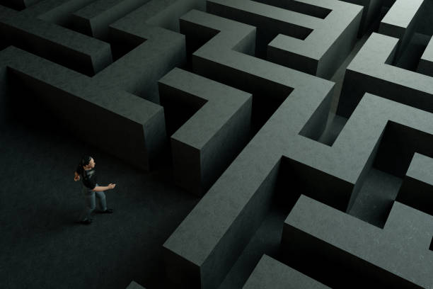 istock 3D maze labyrinth and businessman 1190694963