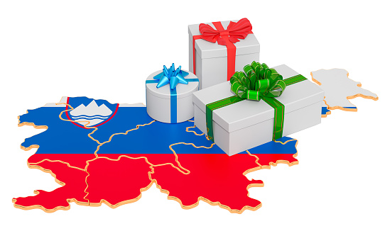 Gift boxes on the Slovenian map. Christmas and New Year holidays in Slovenia concept. 3D rendering isolated on white background
