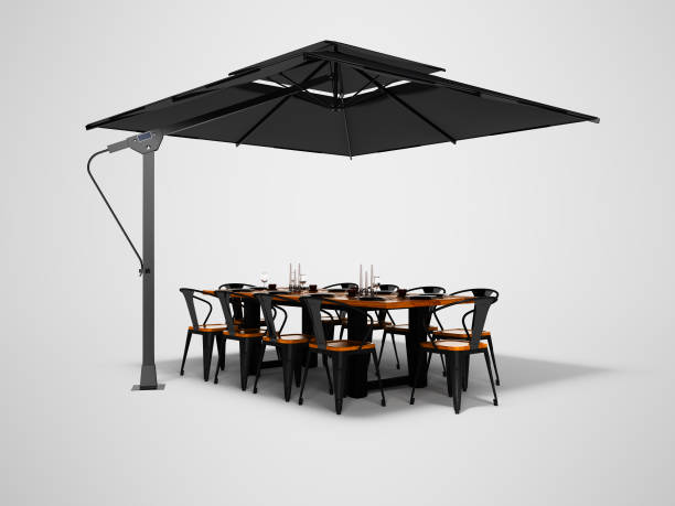 istock Concept umbrella for restaurant on side support with table and chairs 3d render on gray background with shadow 1190696512