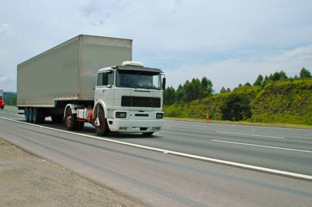 istock truck on multi-lane highway 1190699753