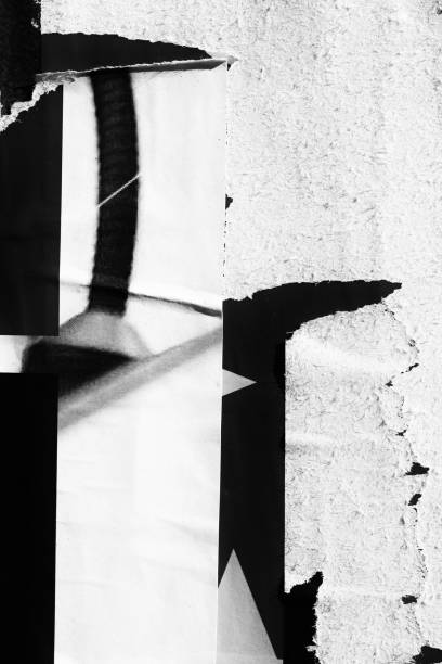 istock Blank white black old ripped torn paper crumpled creased posters grunge textures backdrop backgrounds placard 1190705700