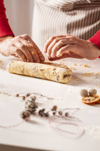 istock Baking a tradinional german fruit cake stollen. Christmas stollen 1190708679
