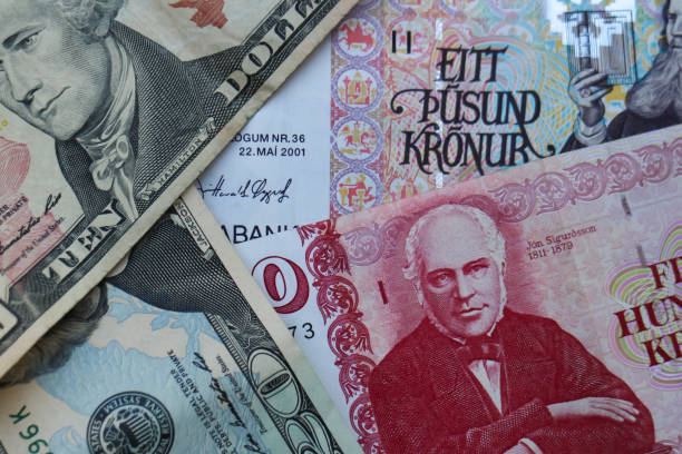 istock Icelandic Krona and US Dollar banknotes 1190713723