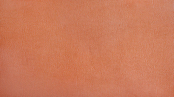 istock Brown leather texture closeup. Useful as background for design-works. 1190717637