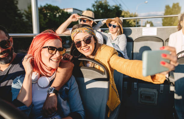 istock Cool tourists taking a selfie while exploring new city 1190721144