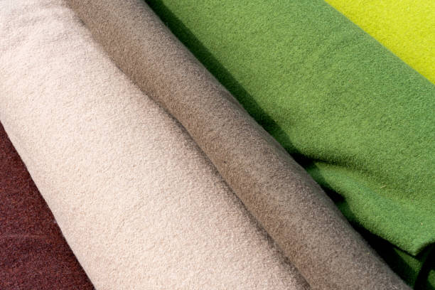 istock Soft woolen fabrics for medieval clothing in various colours. Broadcloth is a dense, plain woven cloth of wool. 1190733008