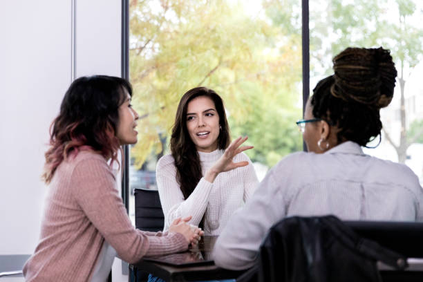 istock Confident mid adult women brainstorm ideas 1190733021