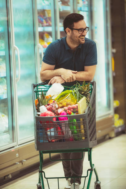 istock A man in a grocery store 1190733323