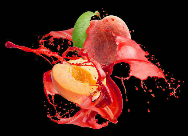 istock peaches in juice splash on a black background 1190742753
