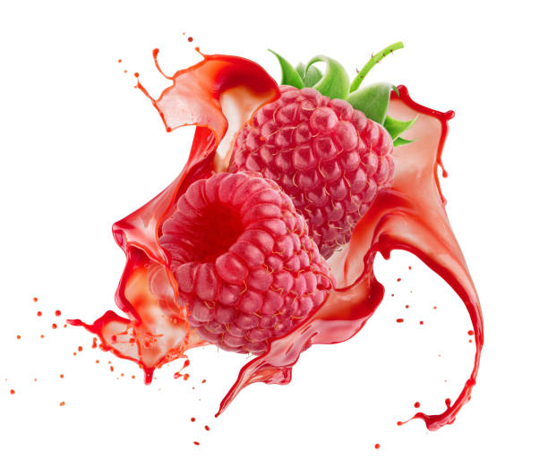 istock raspberries in juice splash isolated on a white background 1190742866